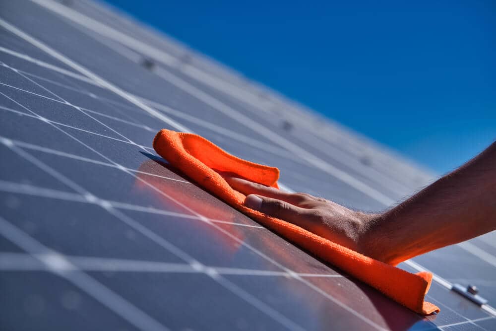 closeup of cleaning solar panels